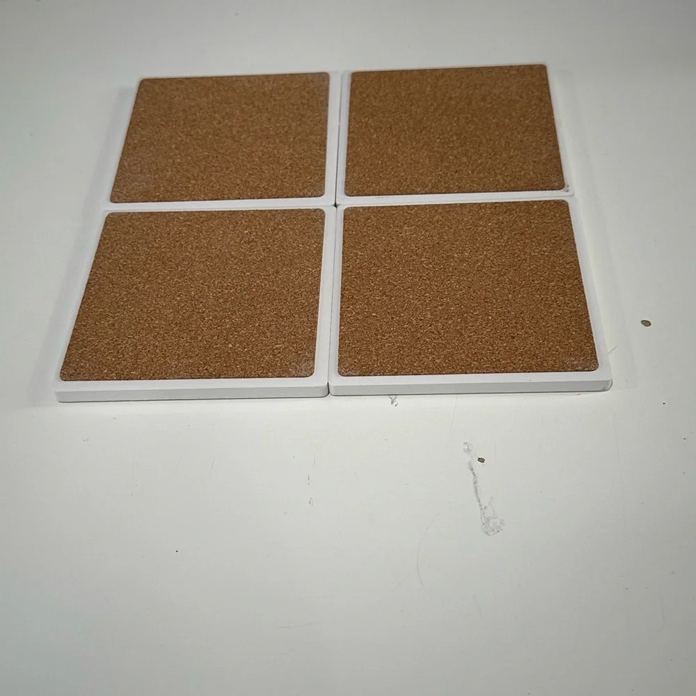 Four set gran Centenario tequila colorful tile coasters. Cork bottom.